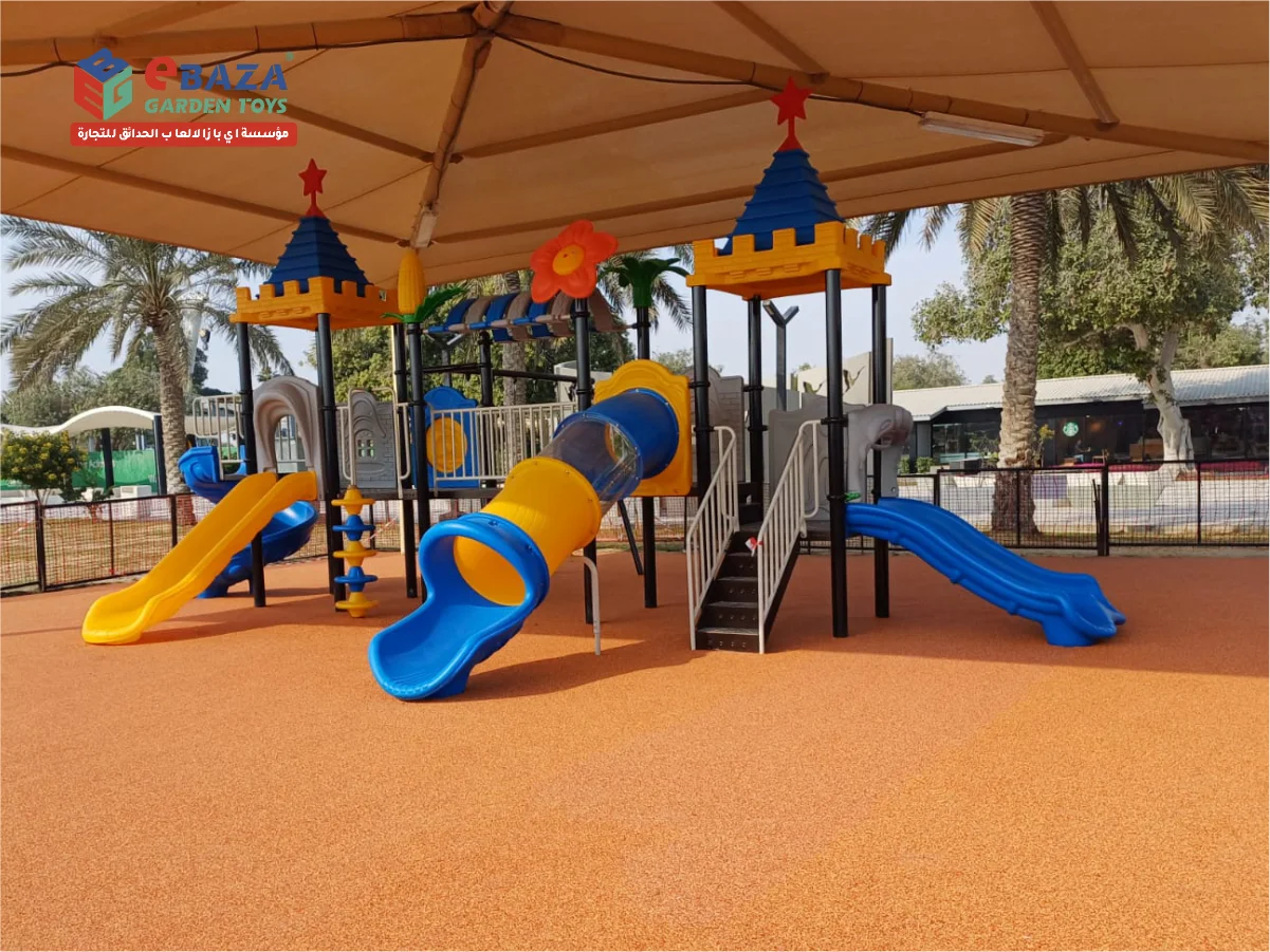 Shaded playground installation at Saudi Aramco Residential Camp Dhahran with EPDM flooring, slides, swings, and premium safe play features.