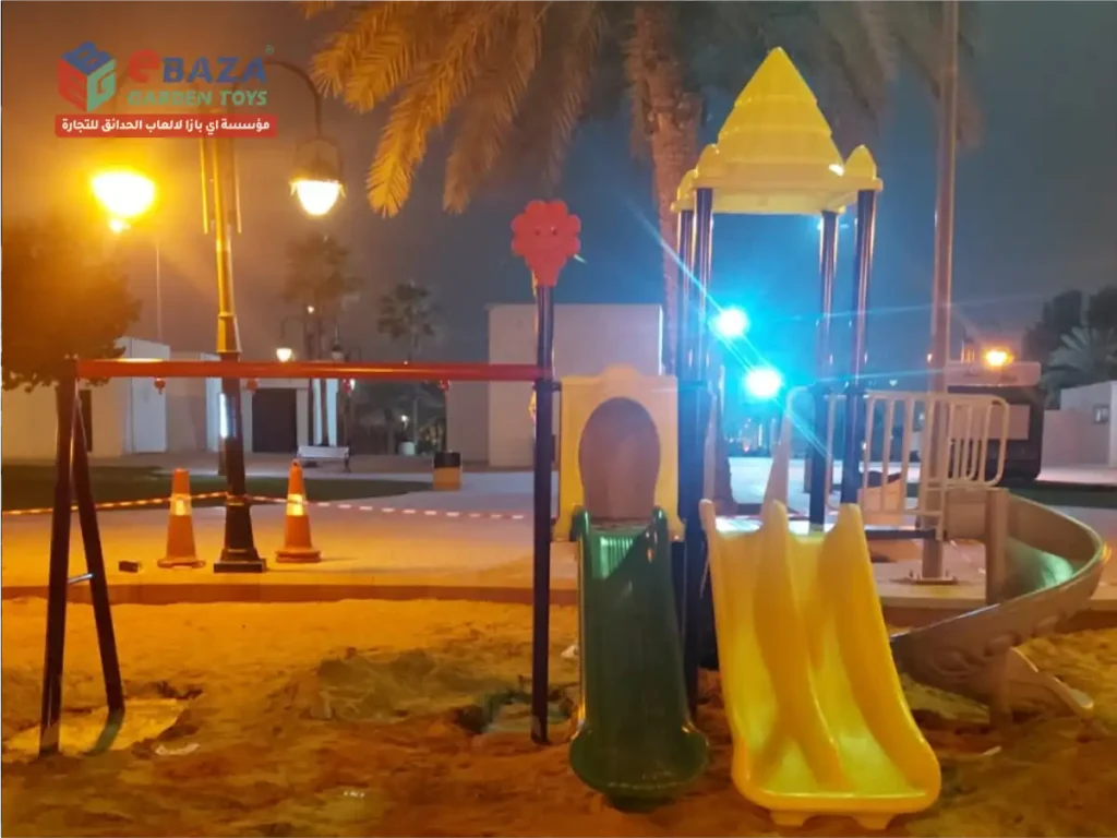 Municipal playground featuring slides, swings, and seesaw installed in Riyadh public park by Ebaza Garden Toys.