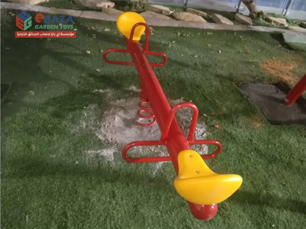 Municipal playground featuring slides, swings, and seesaw installed in Riyadh public park by Ebaza Garden Toys.