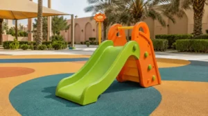 Baby outdoor slide for toddlers in Saudi Arabia with low height, smooth edges, and safe playground flooring.