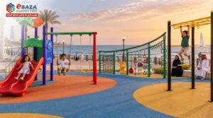 Public park near me in Jeddah - children playing at Waterfront playground with slides and swings