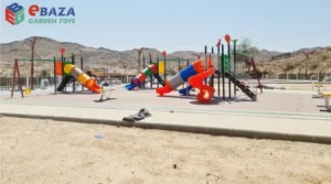 Outdoor playground equipment with tube slides, spiral slides, swing sets, climbing structures and elevated play platforms.