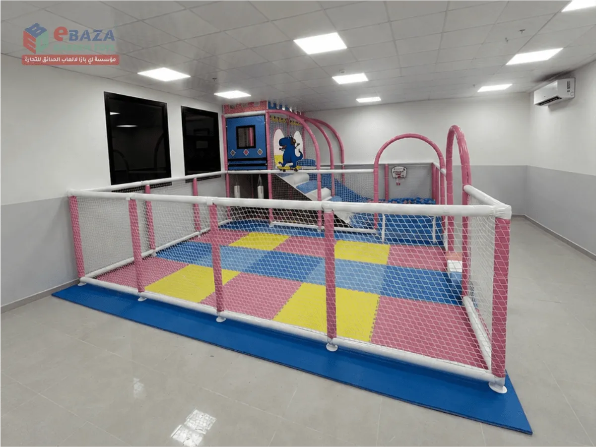 Indoor soft playground with ball pool, slide and safety netting in Tuwaiq, Riyadh.