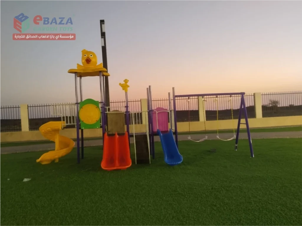 Public park playground installation in Madina with yellow spiral slide, red double slide, blue straight slide and purple outdoor swing set